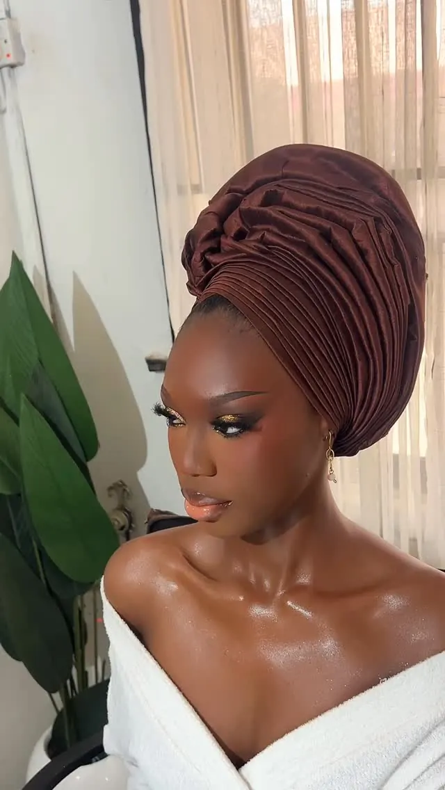 Makeup and gele for an owambe guest by Modupe Oge
